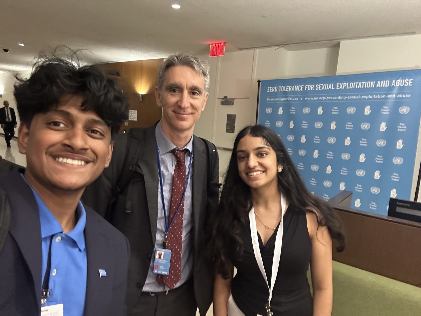 DTC members speaking with a UN official at the United Nations in New York
